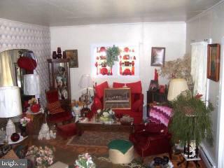 22856 Nanticoke Road Quantico, MD 21856 - Photo 4 of 5 a view of a room with lots of stuff and flowers