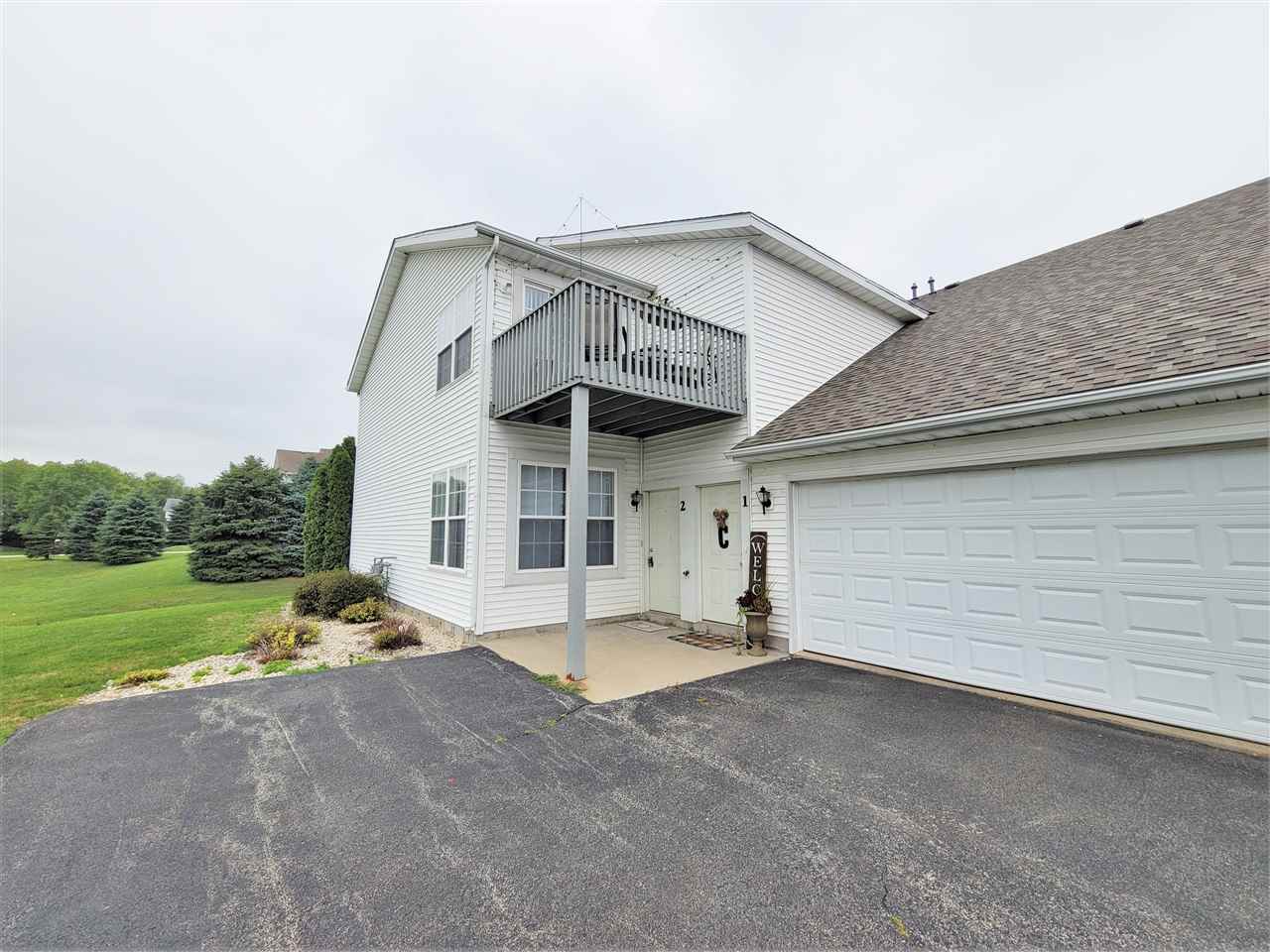 10138 B Monarch Road Roscoe, IL 61073 - Photo 1 of 24 a view of a house with a outdoor space