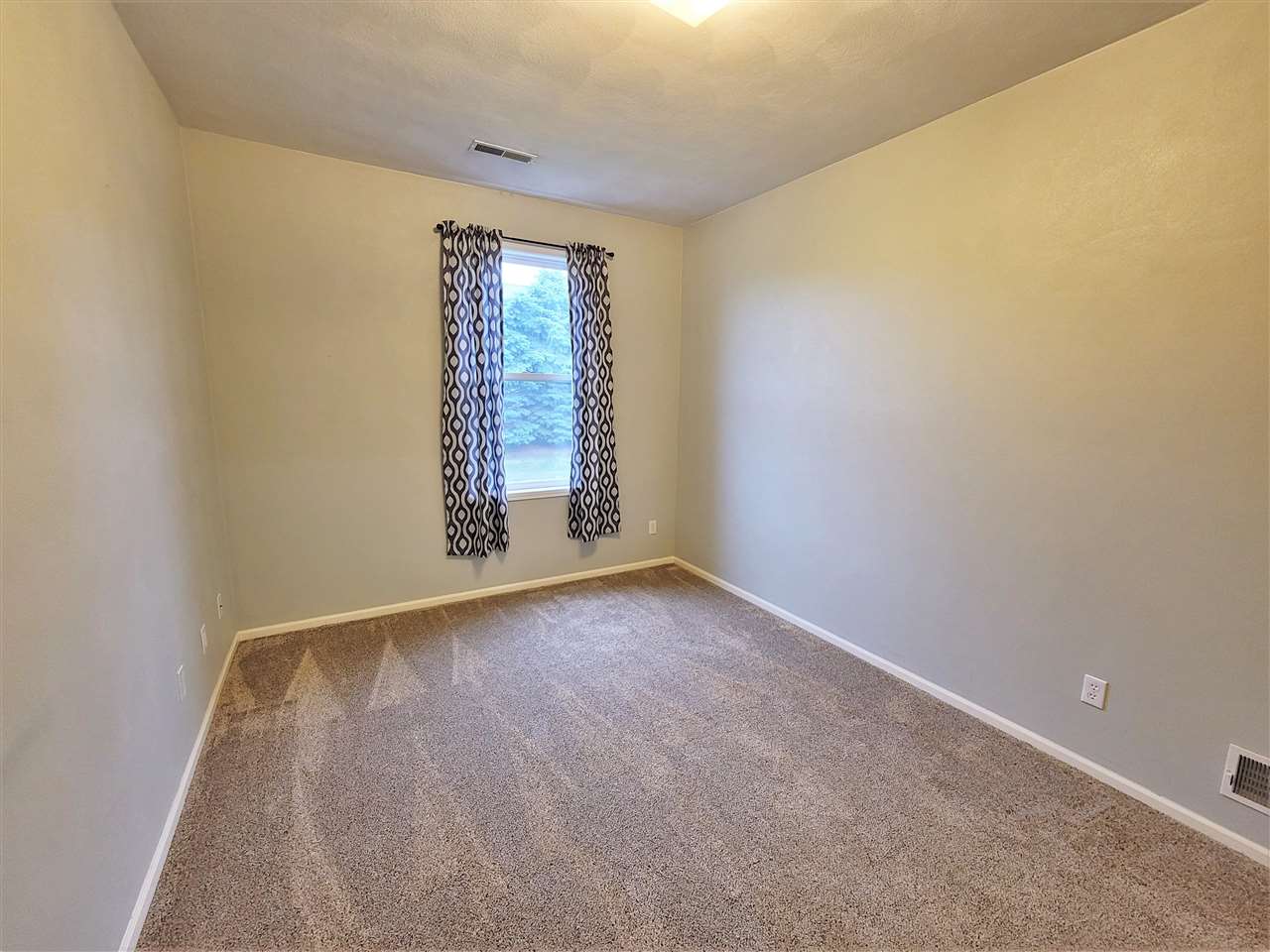 10138 B Monarch Road Roscoe, IL 61073 - Photo 12 of 24 an empty room with windows