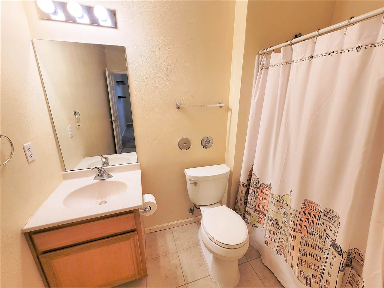 10138 B Monarch Road Roscoe, IL 61073 - Photo 19 of 24 a bathroom with a sink and a mirror