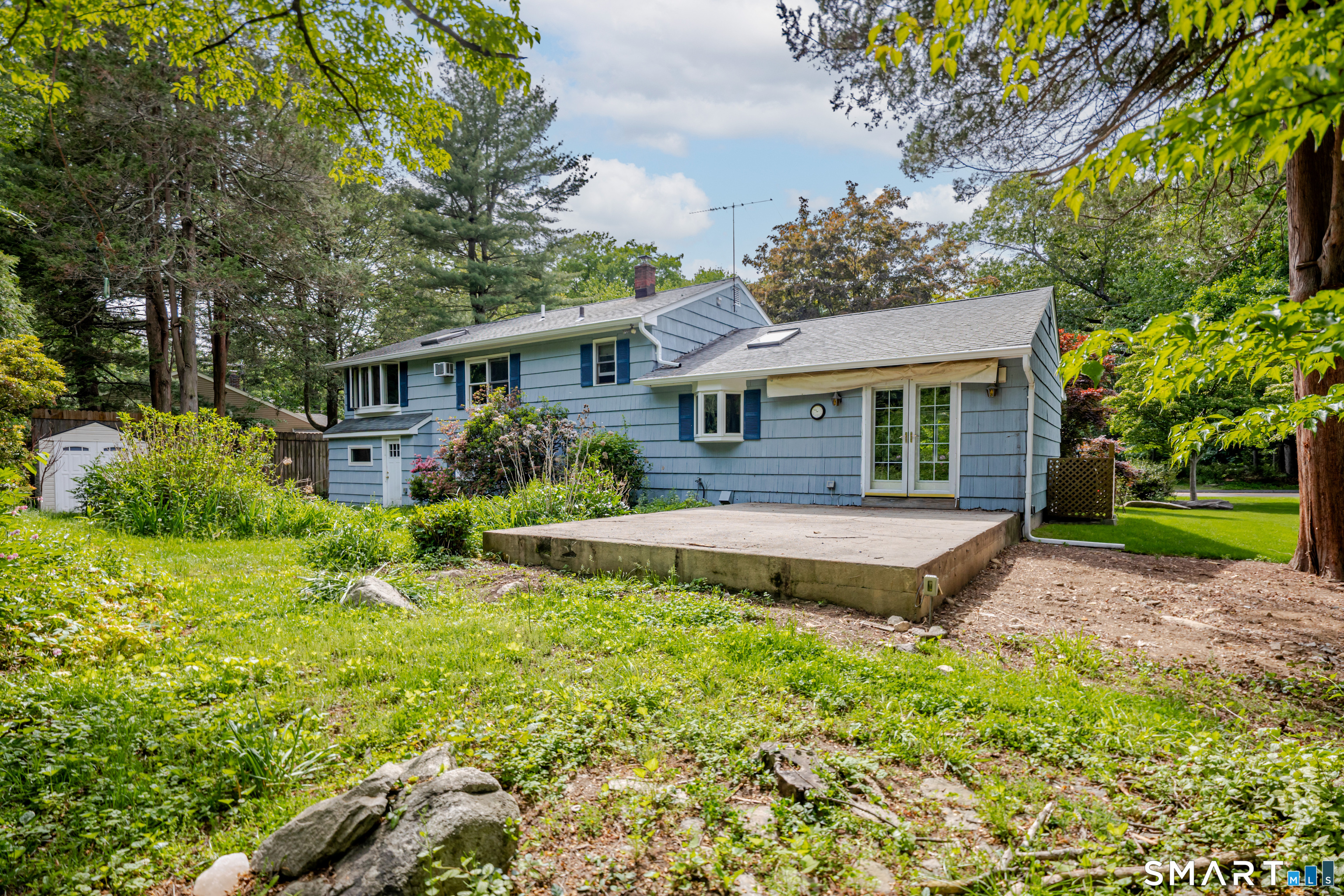 75 Westwood Road Stamford, CT 06902 - Photo 3 of 40 Flat, near-acre yard boasts terrace and dozens of gorgeous trees & shrubs