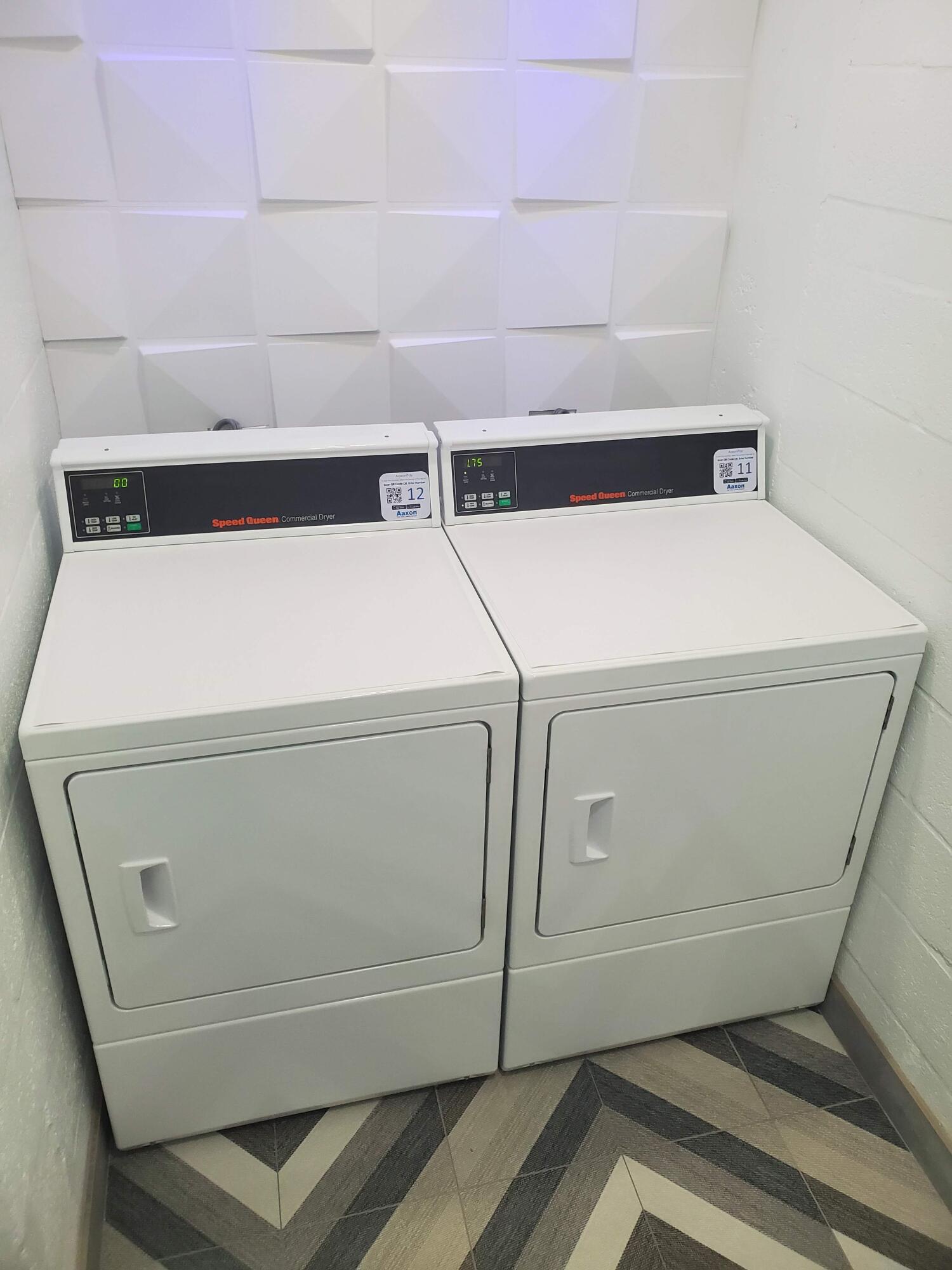 105 South Riverside Drive, Unit 303 Pompano Beach, FL 33062 - Photo 11 of 36 a utility room with dryer and washer