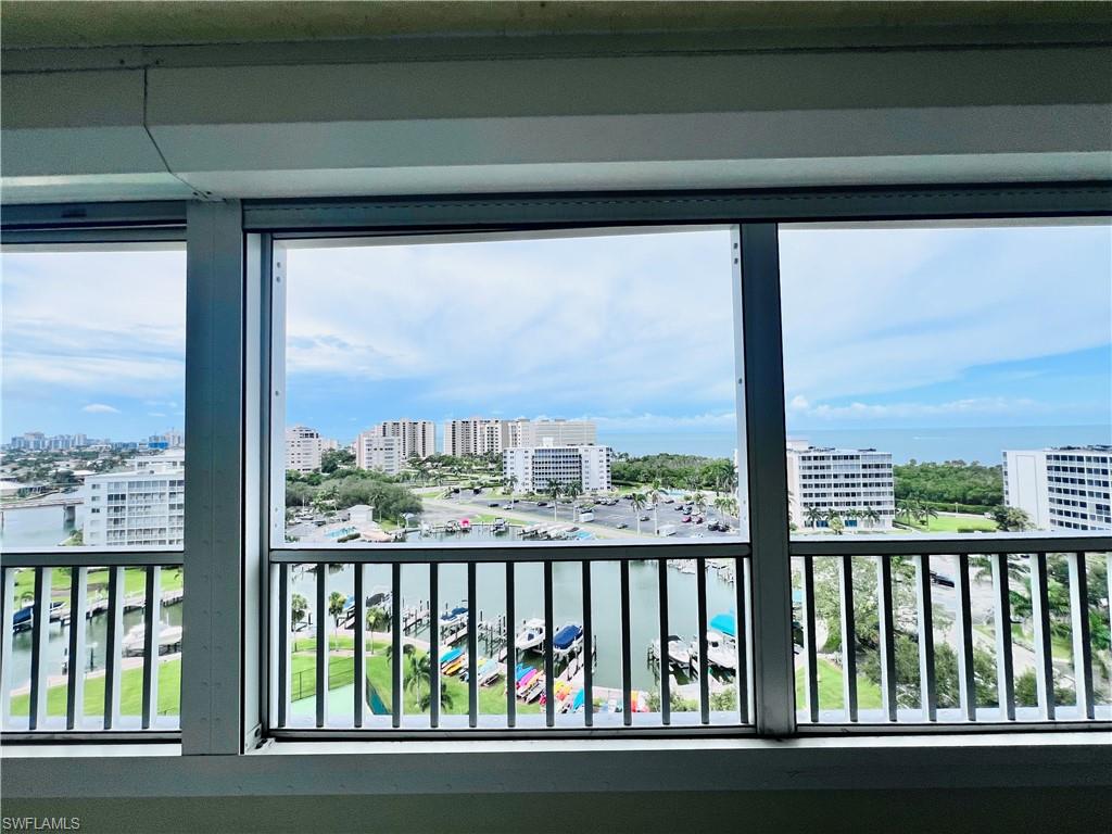 25 Bluebill Avenue, Unit 1002 Naples, FL 34108 - Photo 24 of 34 a view of a balcony from a window