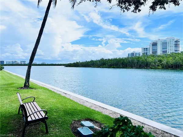 a view of a lake with a garden