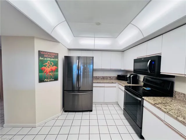 $7,000 | 25 Bluebill Avenue, Unit 1002, Naples, FL 34108