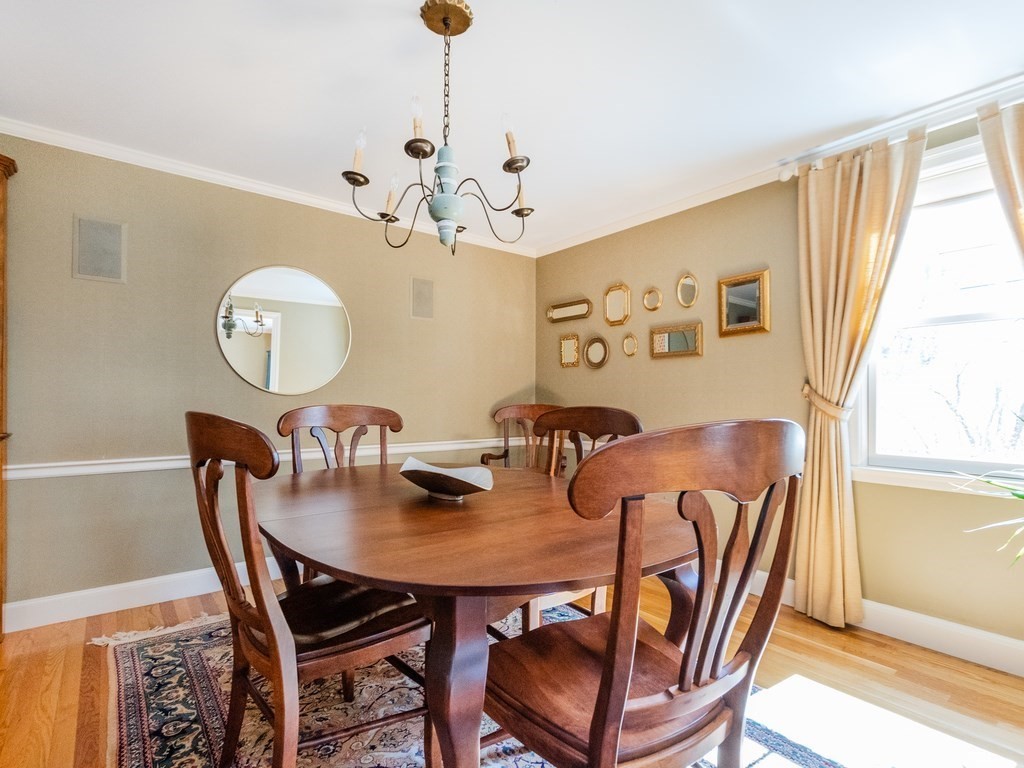 16 Fuller Brook Road Wellesley, MA 02482 - Photo 11 of 36 a view of a dining room with furniture window and wooden floor