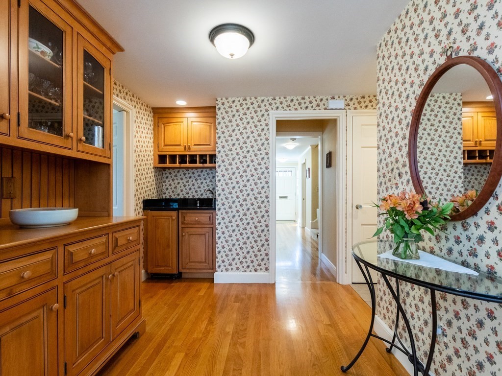 16 Fuller Brook Road Wellesley, MA 02482 - Photo 14 of 36 a kitchen with a sink and cabinets