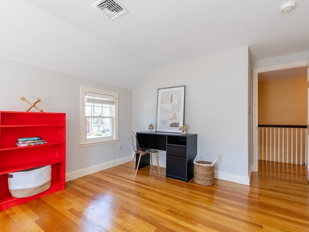 16 Fuller Brook Road Wellesley, MA 02482 - Photo 23 of 36 a living room with furniture and a wooden floor