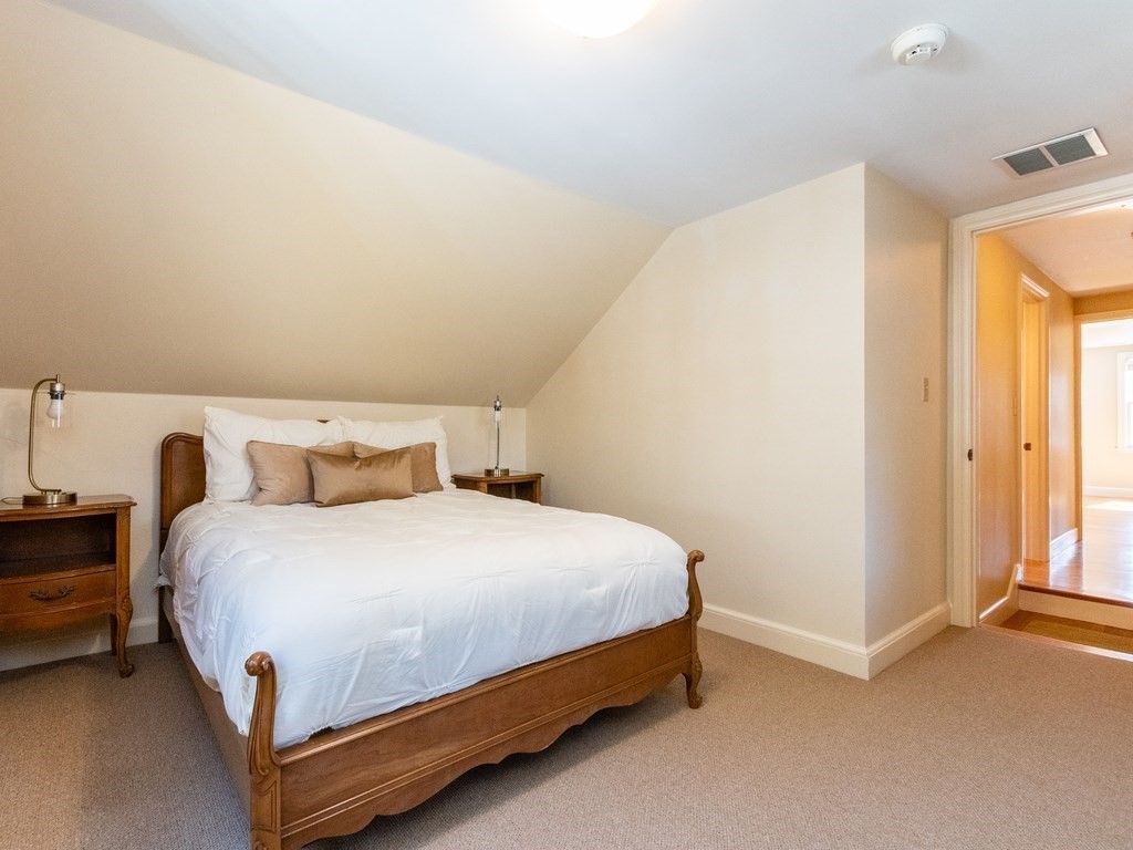 16 Fuller Brook Road Wellesley, MA 02482 - Photo 24 of 36 a bedroom with bed and a window