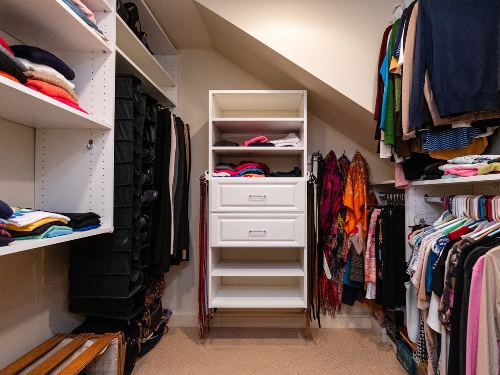 16 Fuller Brook Road Wellesley, MA 02482 - Photo 29 of 36 a view of walk in closet with clothes and shoes