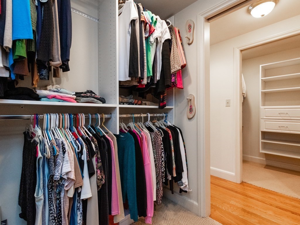 16 Fuller Brook Road Wellesley, MA 02482 - Photo 30 of 36 a view of walk in closet with clothes and shoes