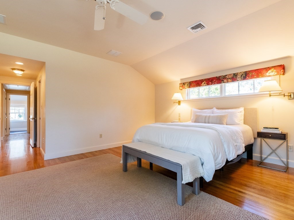 16 Fuller Brook Road Wellesley, MA 02482 - Photo 4 of 36 a bedroom with a bed and lamp