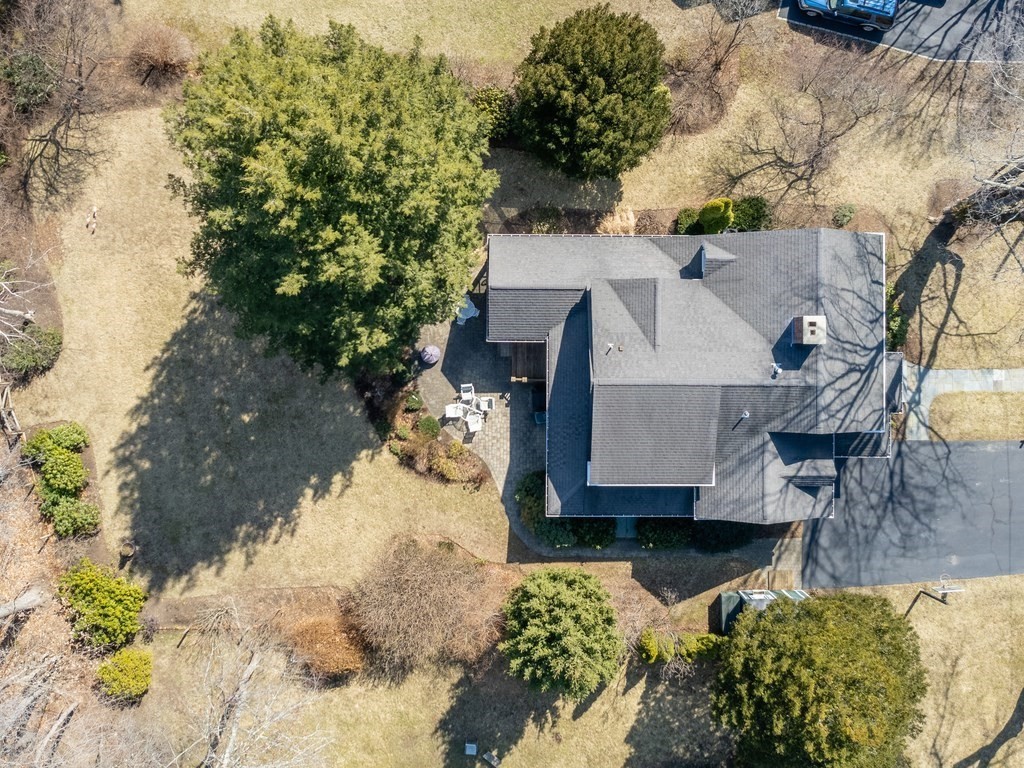 16 Fuller Brook Road Wellesley, MA 02482 - Photo 7 of 36 an aerial view of a house with a yard covered with snow