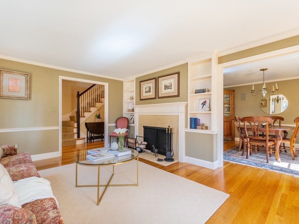16 Fuller Brook Road Wellesley, MA 02482 - Photo 10 of 36 a living room with furniture and a fireplace