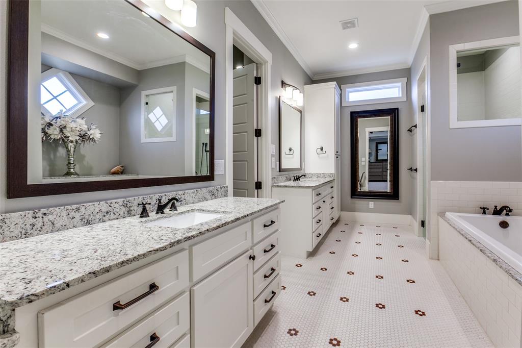 413 Ridge Crest Drive Richardson, TX 75080 - Photo 27 of 34 a spacious bathroom with a sink double vanity granite and a mirror
