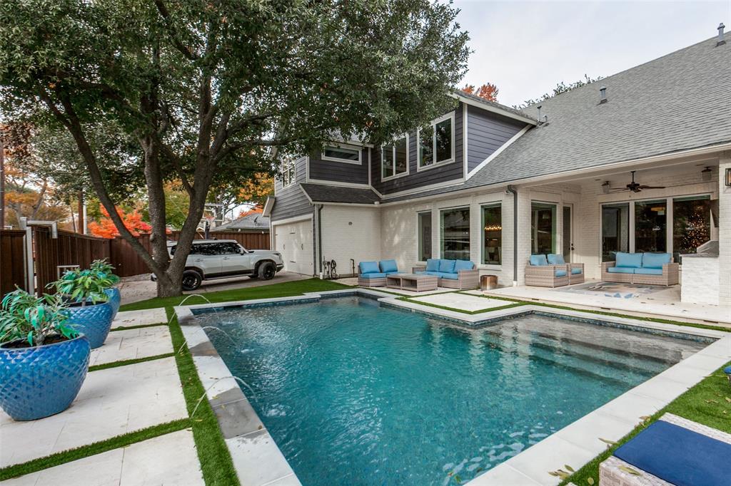 413 Ridge Crest Drive Richardson, TX 75080 - Photo 32 of 34 a view of a house with swimming pool and sitting area
