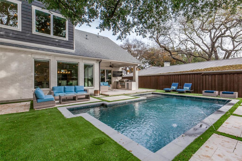 413 Ridge Crest Drive Richardson, TX 75080 - Photo 33 of 34 a view of a house with a yard patio and fire pit