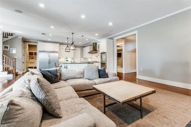 a living room with furniture and a table