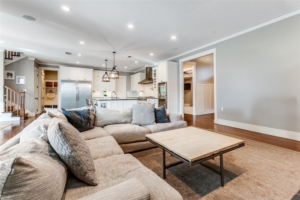 413 Ridge Crest Drive Richardson, TX 75080 - Photo 5 of 34 a living room with furniture and a table