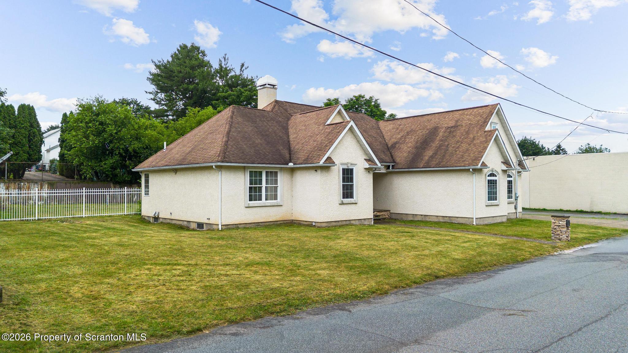 116 Forge Street Old Forge, PA 18518 - Photo 44 of 49 a view of a house with a yard