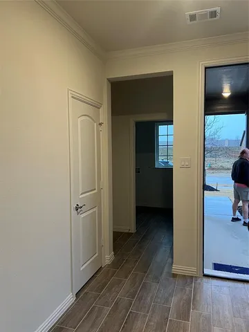 a view of a livingroom from a hallway