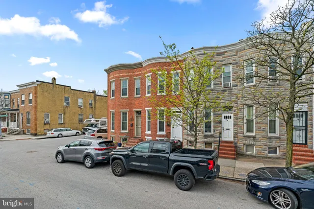 a car parked in front of a building
