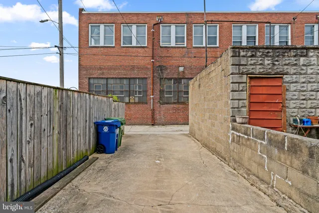 a view of a street with a building