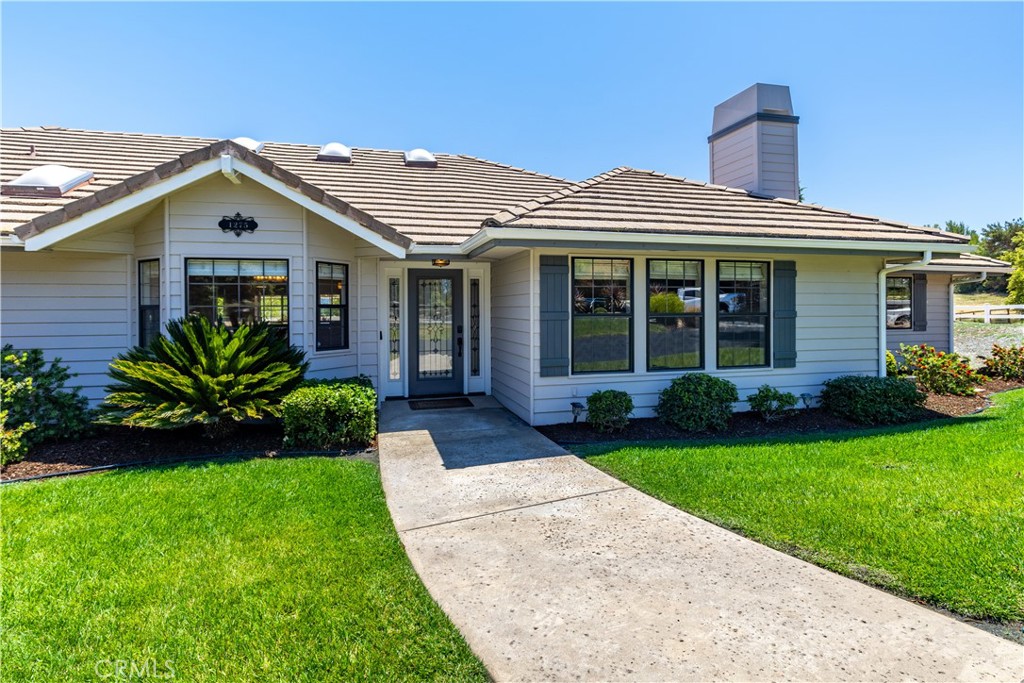1275 Shane Lane Templeton, CA 93465 - Photo 7 of 70 a front view of a house with a garden