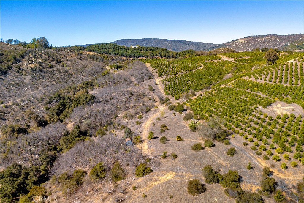 34 Los Gatos Road Temecula, CA 92590 - Photo 4 of 12 a view of a field with mountains in the background