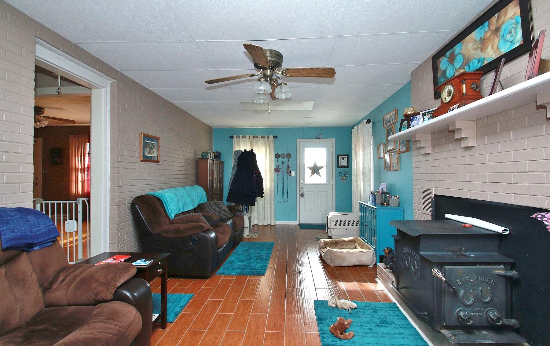 525 Olney Road Vinton, VA 24179 - Photo 7 of 17 a living room with furniture and a fireplace
