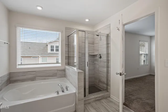 a bathroom with a double vanity sink and mirror