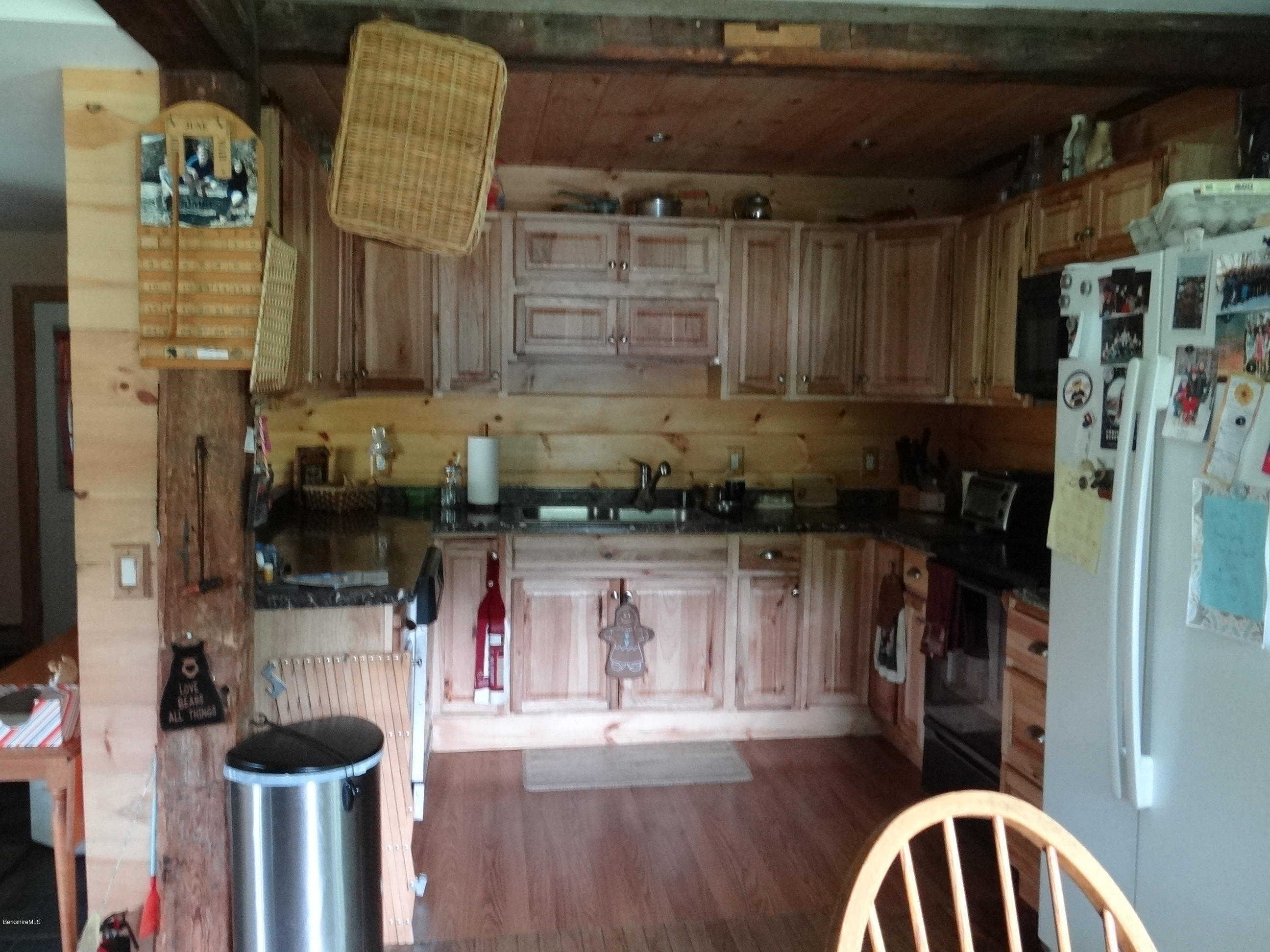 105 Chapel Road Savoy, MA 01256 - Photo 5 of 28 a kitchen with a refrigerator and a stove