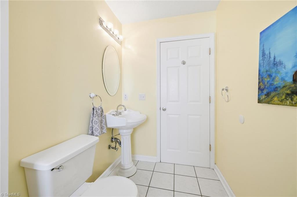 1008 Kingstree Ridge Drive Winston-Salem, NC 27127 - Photo 19 of 50 main floor powder bathroom with attached laundry room