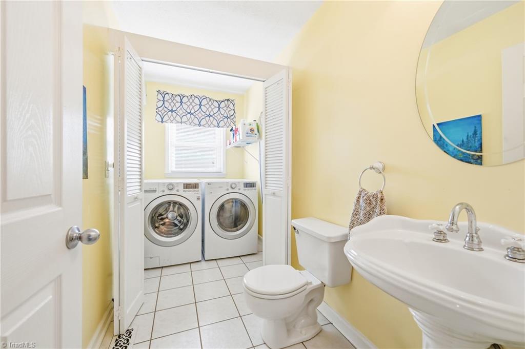 1008 Kingstree Ridge Drive Winston-Salem, NC 27127 - Photo 20 of 50 main floor powder bathroom with attached laundry room