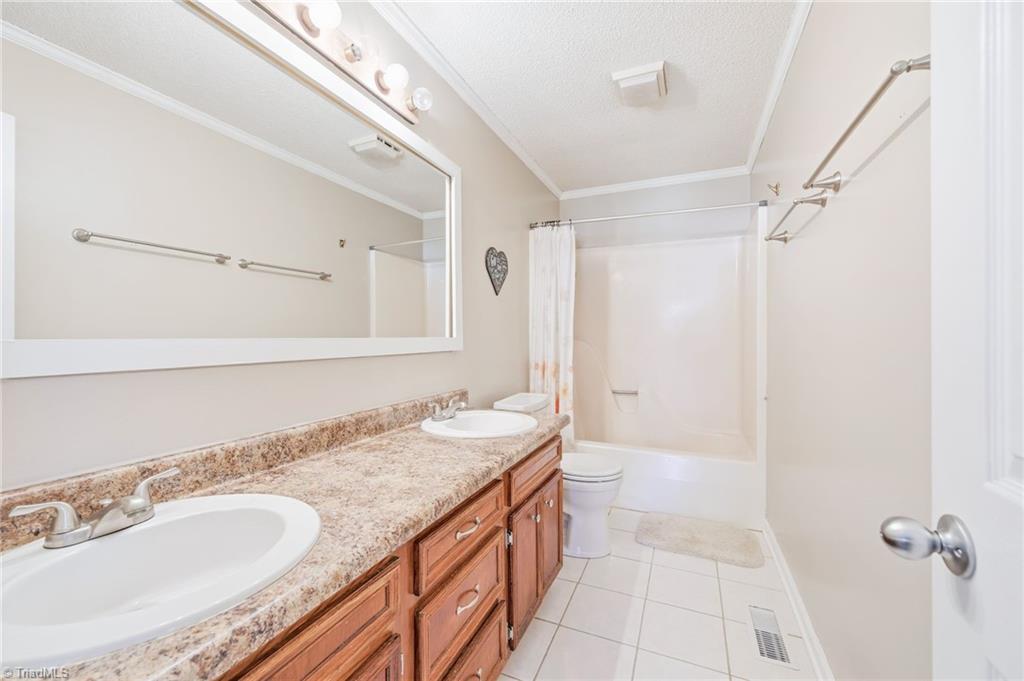 1008 Kingstree Ridge Drive Winston-Salem, NC 27127 - Photo 24 of 50 primary bathroom with double sinks