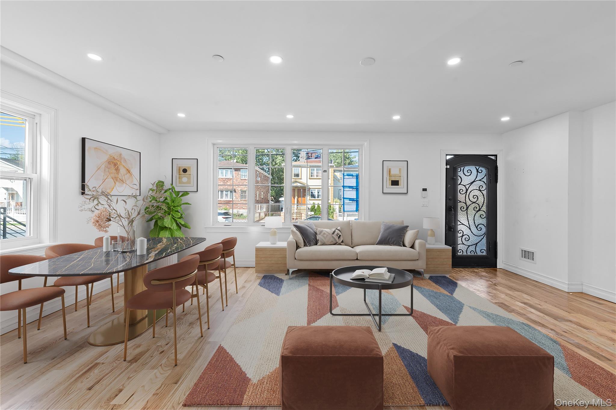 258-10 147th Road Queens, NY 11422 - Photo 2 of 26 Living area with recessed lighting and light wood-type flooring