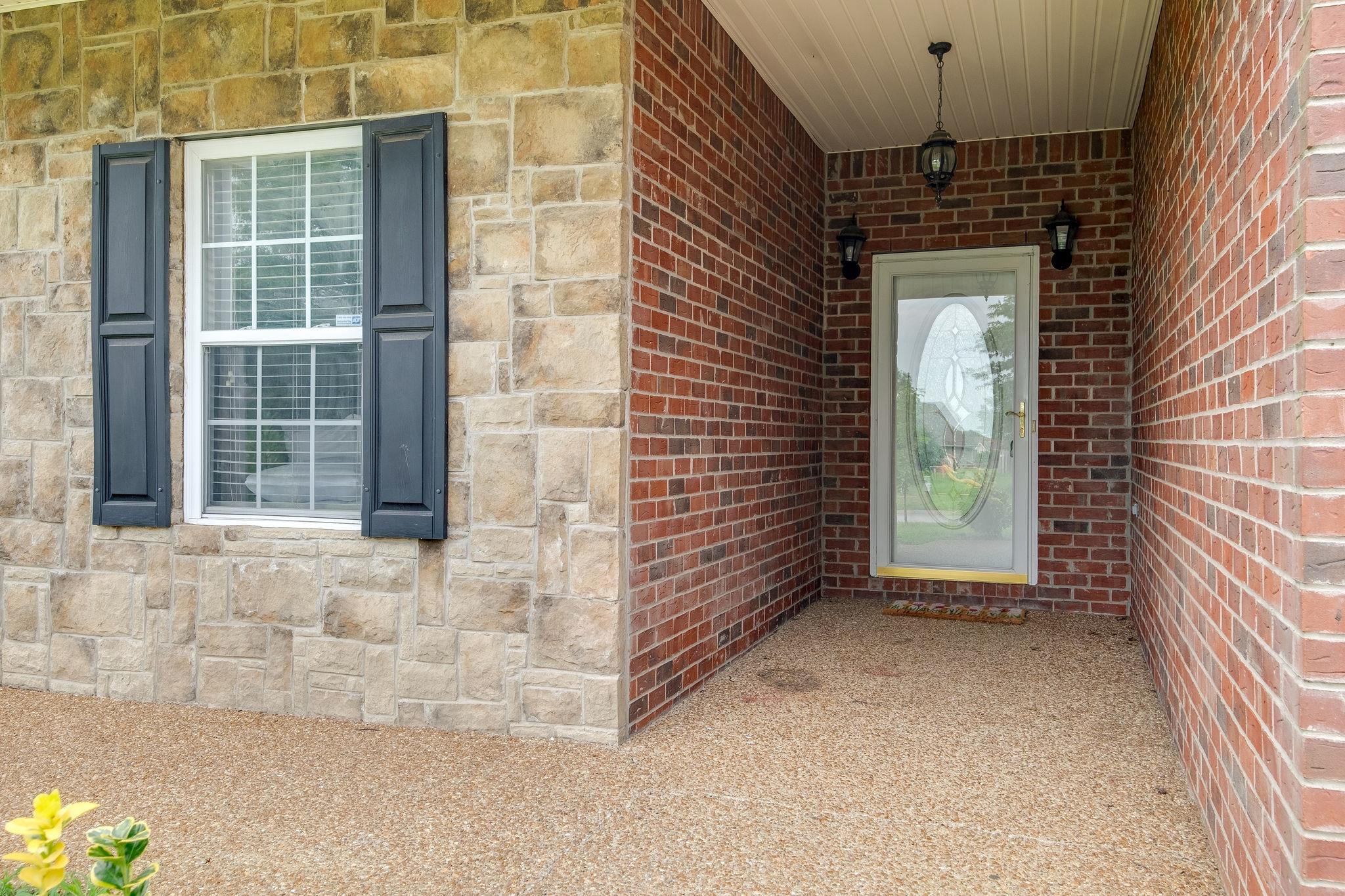 STONE & BRICK COVERED ENTRY