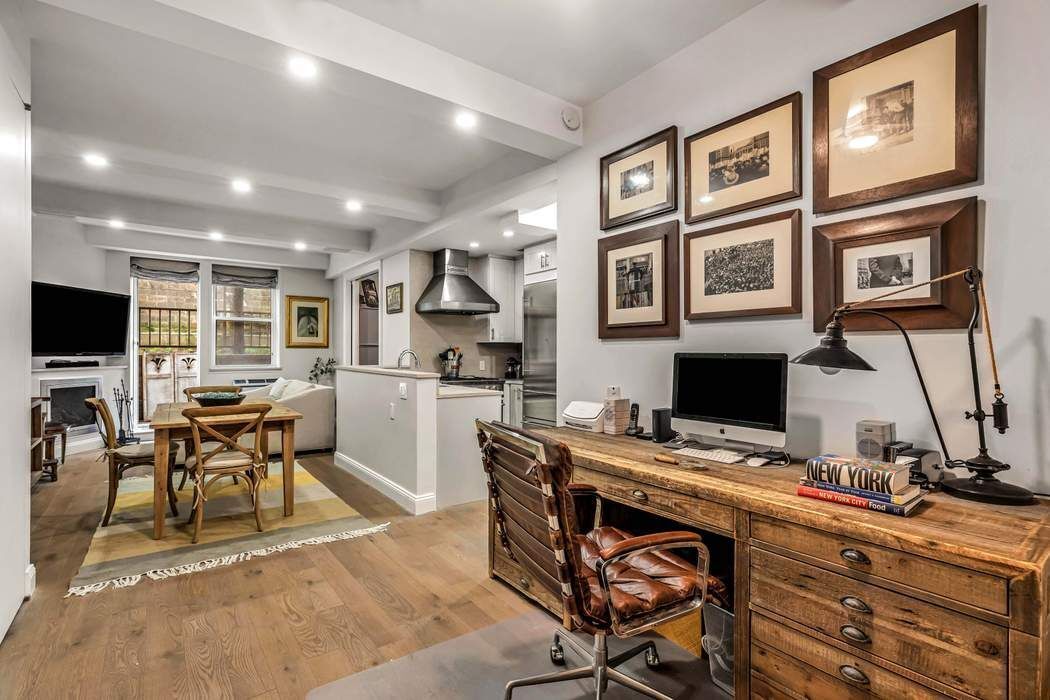 64 East 94th Street, Unit 1G Manhattan, NY 10128 - Photo 3 of 11 a view of a workspace with furniture