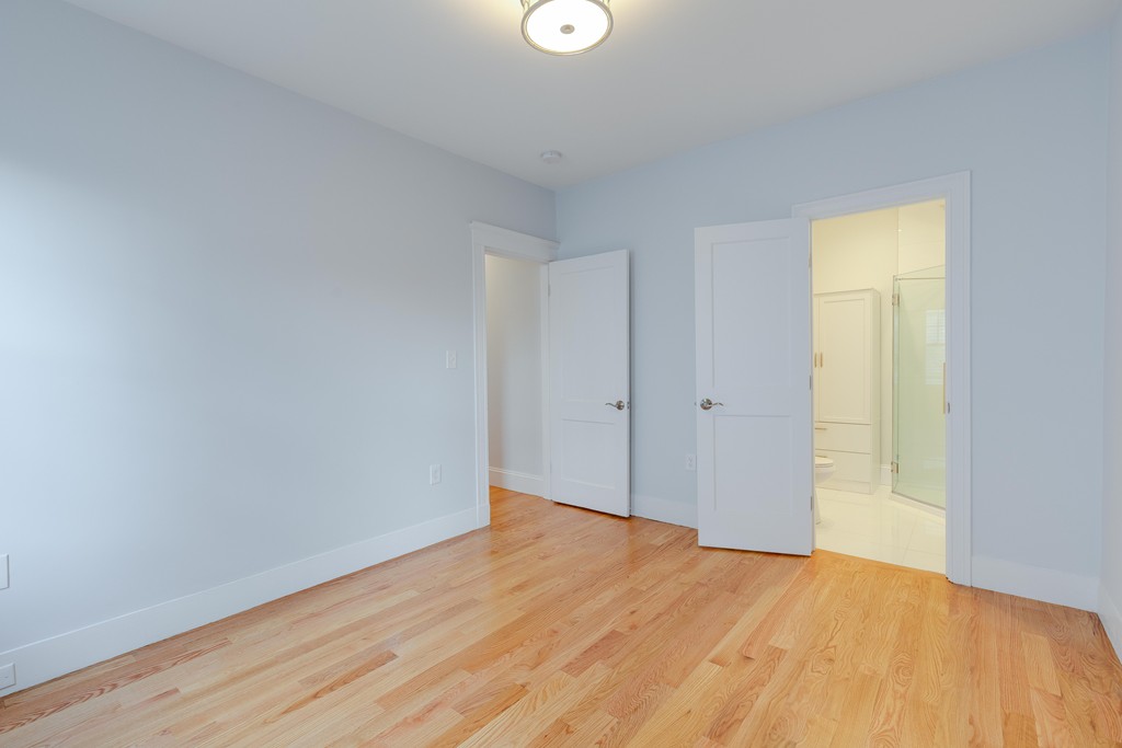 57 Katherine Road, Unit 57 Watertown, MA 02472 - Photo 14 of 30 a view of empty room with wooden floor