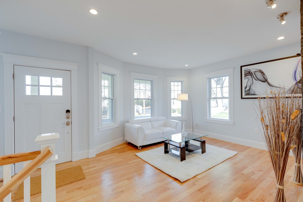 57 Katherine Road, Unit 57 Watertown, MA 02472 - Photo 7 of 30 a living room with furniture and window