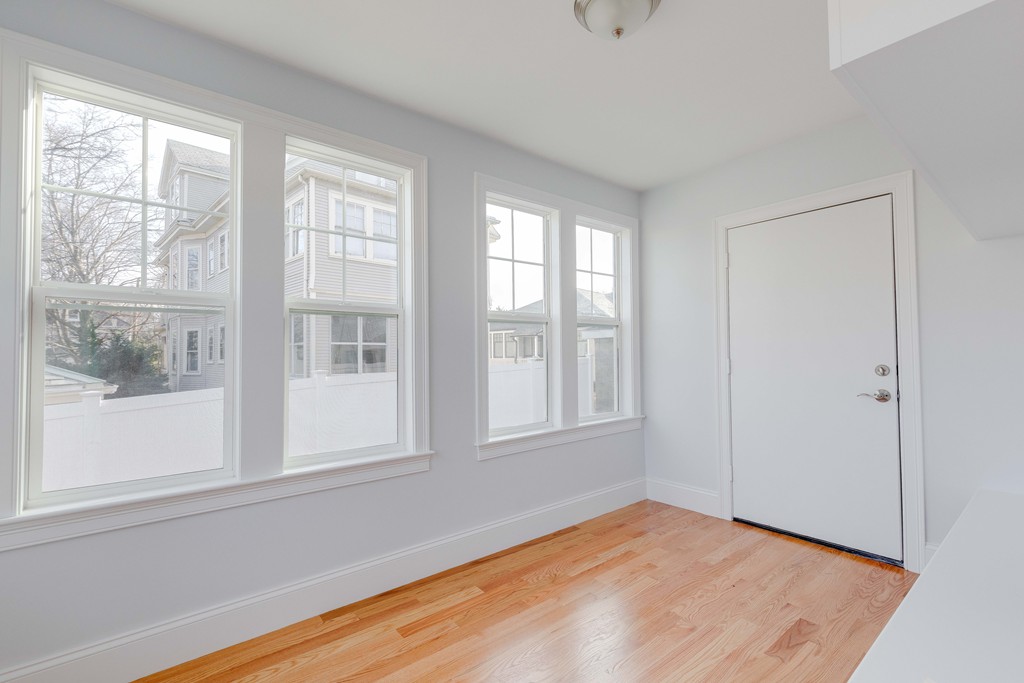 57 Katherine Road, Unit 57 Watertown, MA 02472 - Photo 10 of 30 a view of an empty room with a window