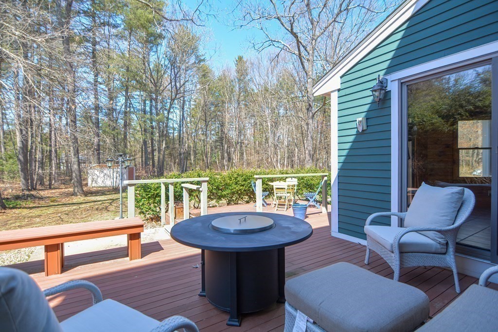 27 Wilson Pond Road Rowley, MA 01969 - Photo 8 of 42 a view of a outdoor seating area