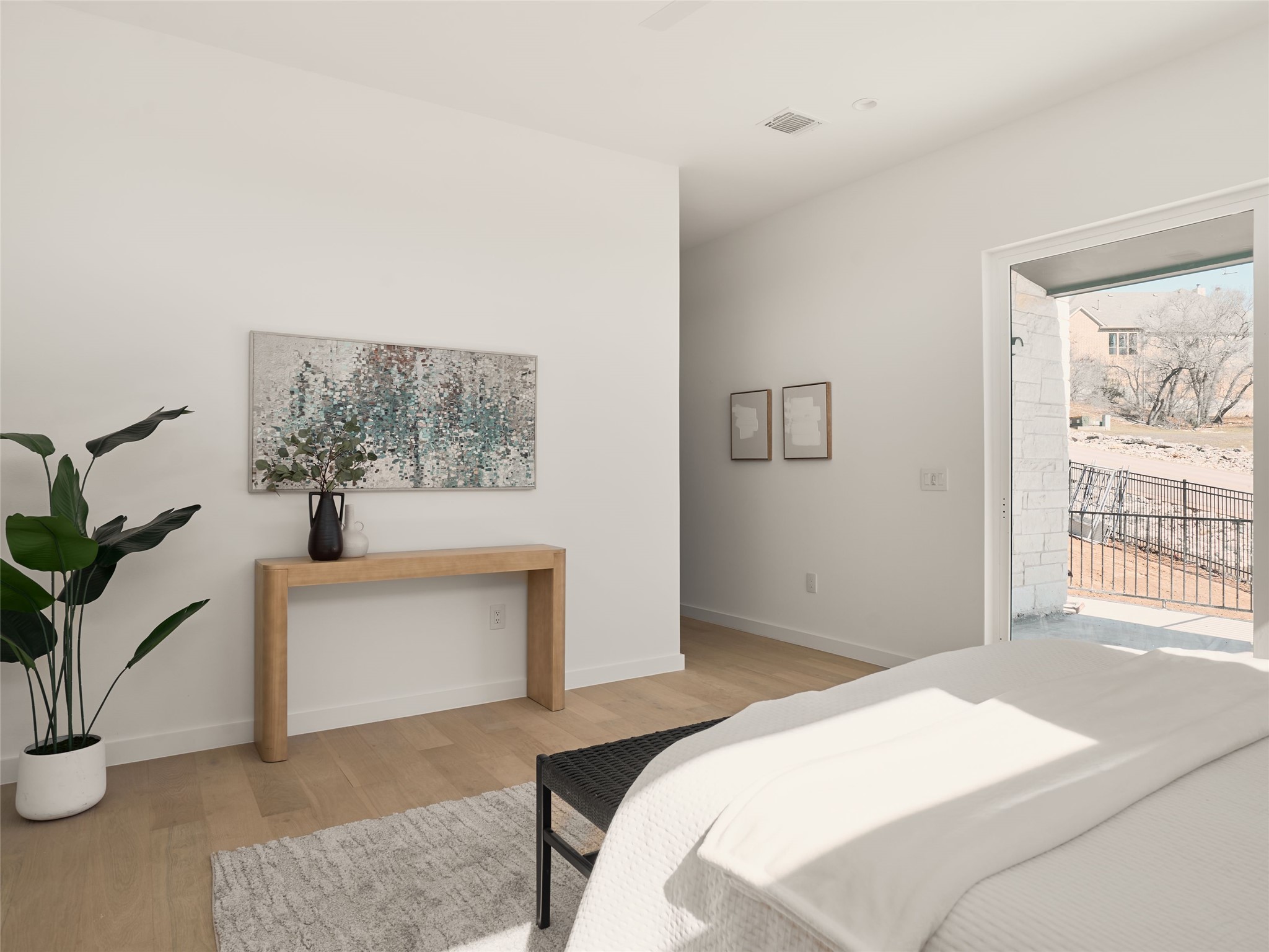 2100 Bighorn Leander, TX 78641 - Photo 12 of 36 Bedroom with light wood-style floors, access to exterior, and ceiling fan