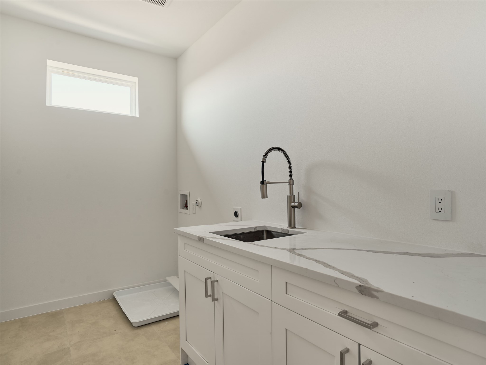 2100 Bighorn Leander, TX 78641 - Photo 26 of 36 Laundry area featuring hookup for a washing machine, cabinet space, and electric dryer hookup