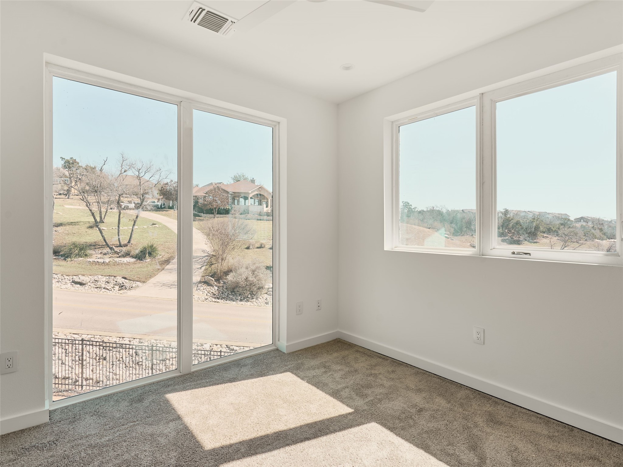 2100 Bighorn Leander, TX 78641 - Photo 28 of 36 Unfurnished room featuring healthy amount of natural light and carpet