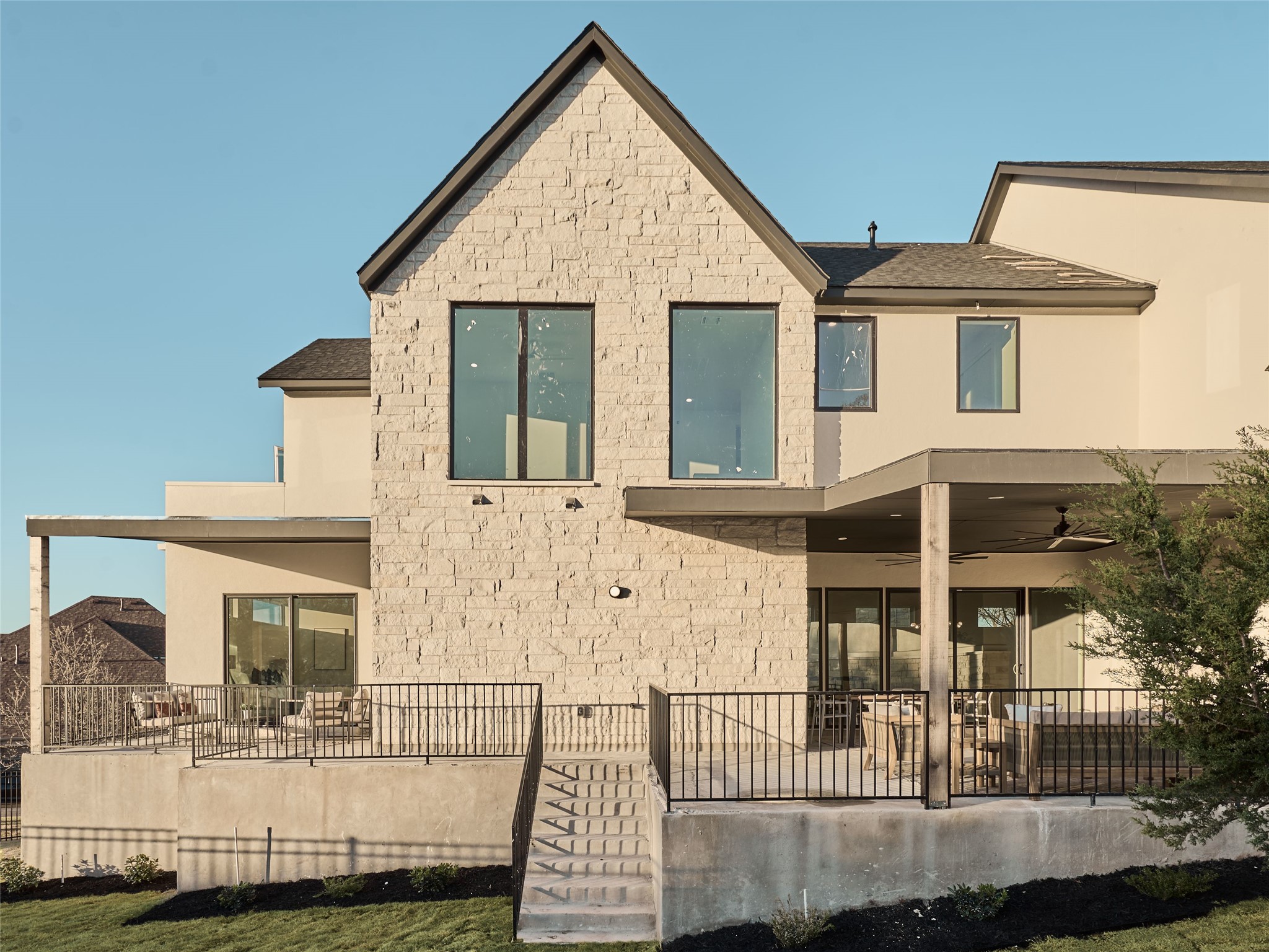 2100 Bighorn Leander, TX 78641 - Photo 31 of 36 Rear view of house featuring roof with shingles and a patio area