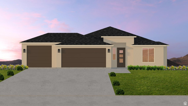 4987 North 970th East Enoch, UT 84721 - Photo 9 of 14 View of front of property featuring a garage, stucco siding, driveway, and roof with shingles