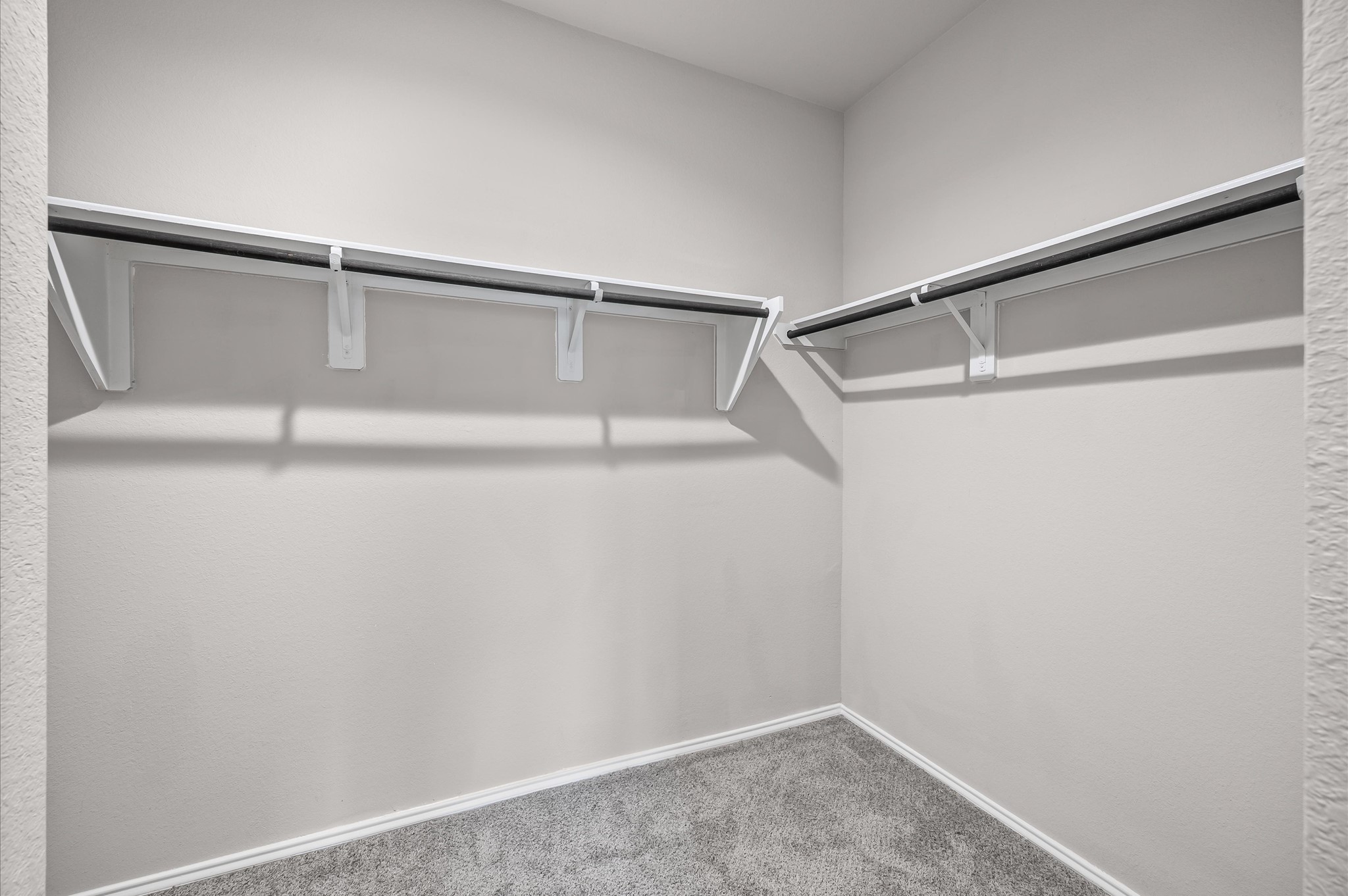 23522 Wedgewood Cliff Way Spring, TX 77373 - Photo 16 of 30 a view of an empty walk in closet