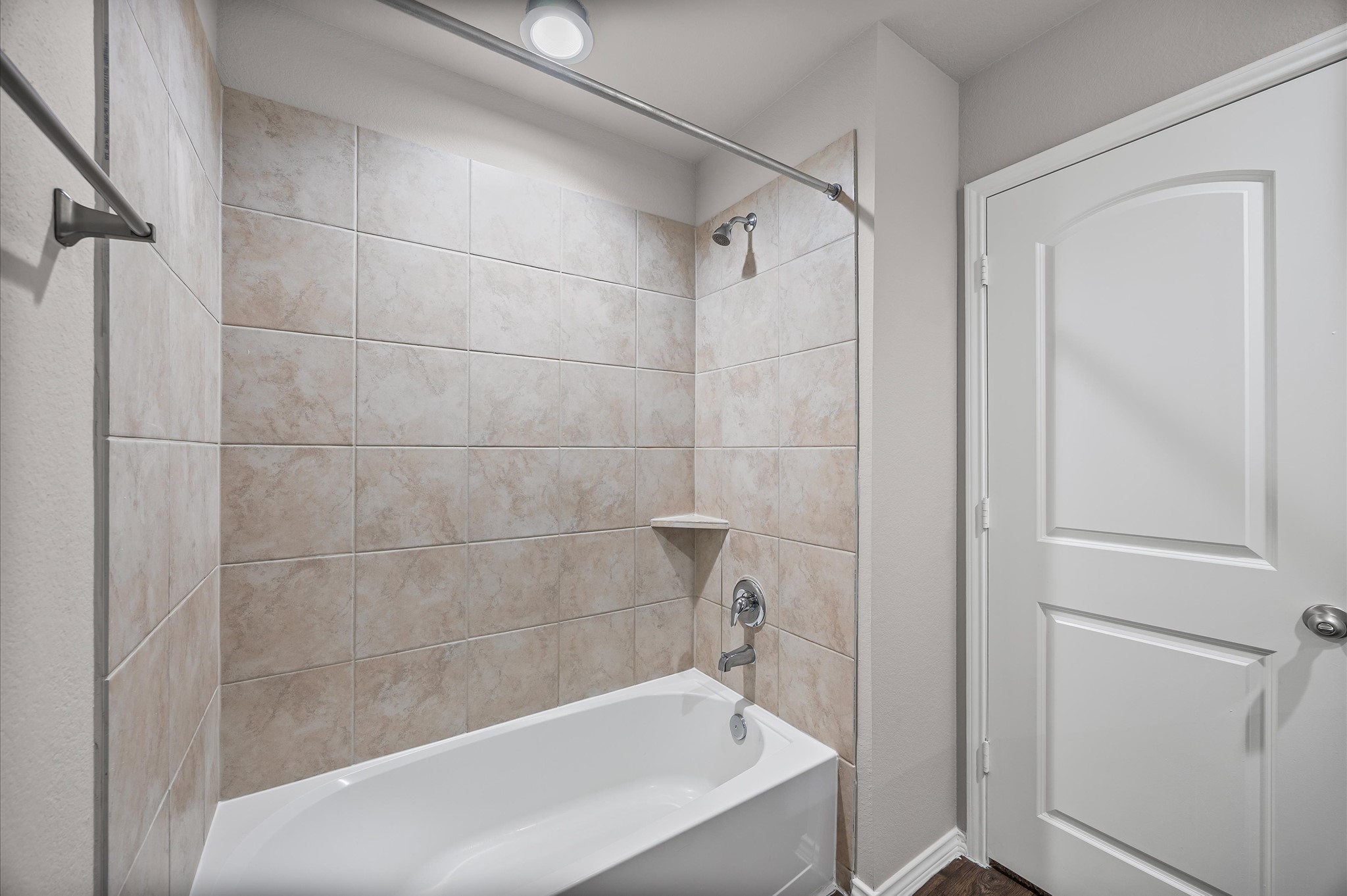 23522 Wedgewood Cliff Way Spring, TX 77373 - Photo 23 of 30 a bathroom with a bathtub and a shower