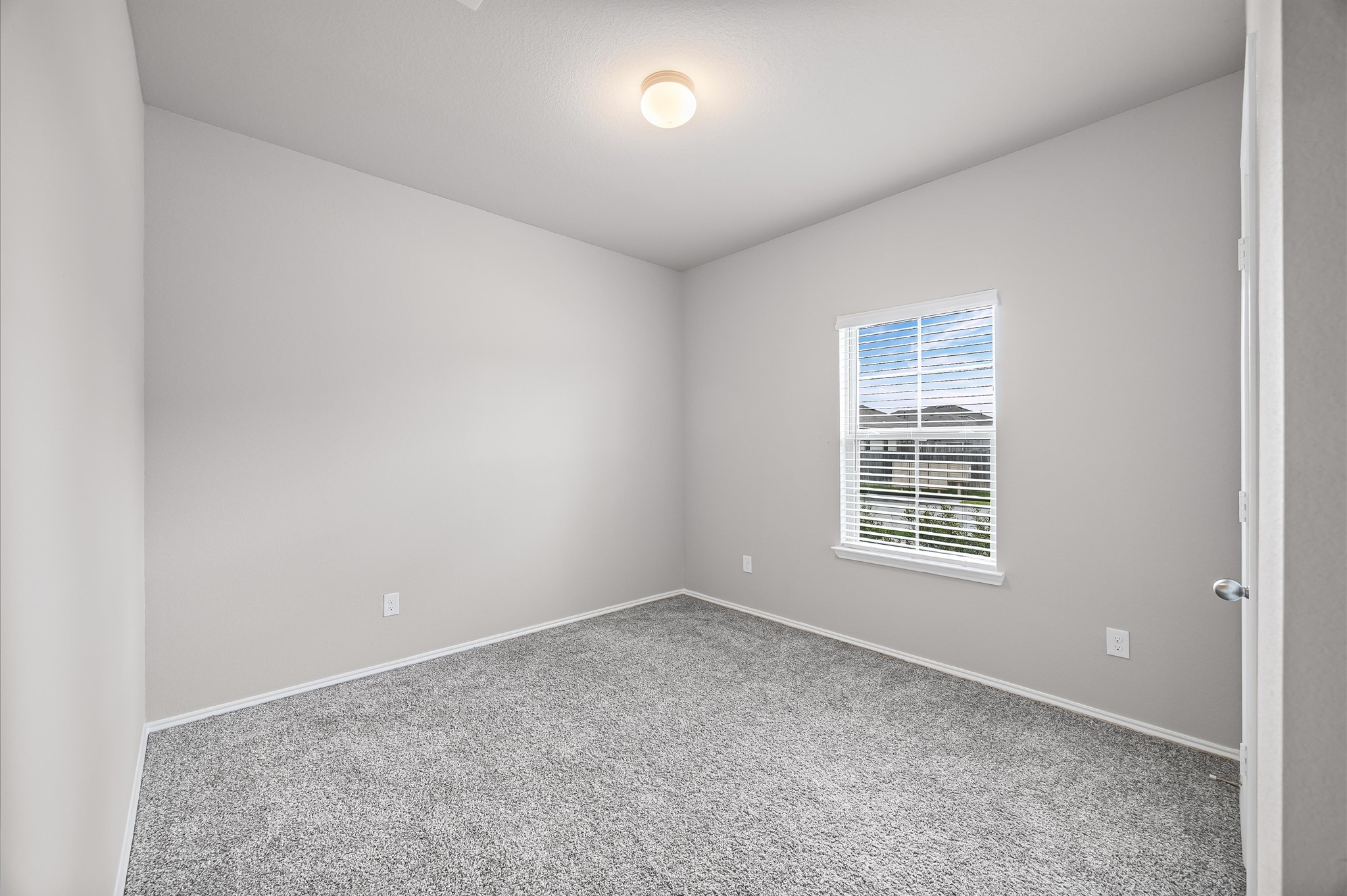 23522 Wedgewood Cliff Way Spring, TX 77373 - Photo 27 of 30 an empty room with a window